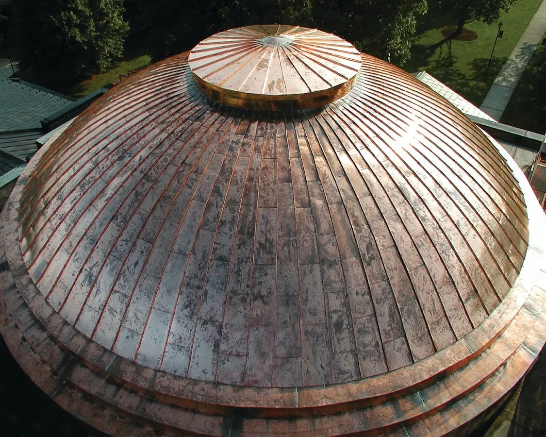 Craftsman Roofing crew installing a new roof in Concord